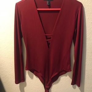 Long sleeve maroon body suit